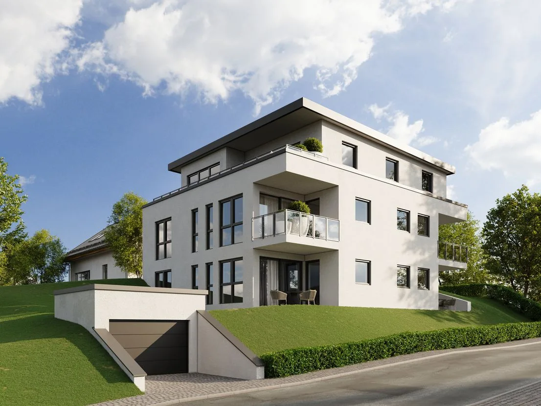 Modernes Mehrfamilienhaus mit Balkonen und Tiefgarageneinfahrt